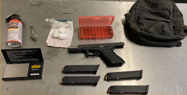 Seizure of Guns and drugs. Clicking on picture leads to Facebook post