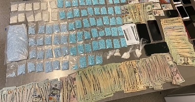 Drugs and Money, clicking on picture leads to social media post